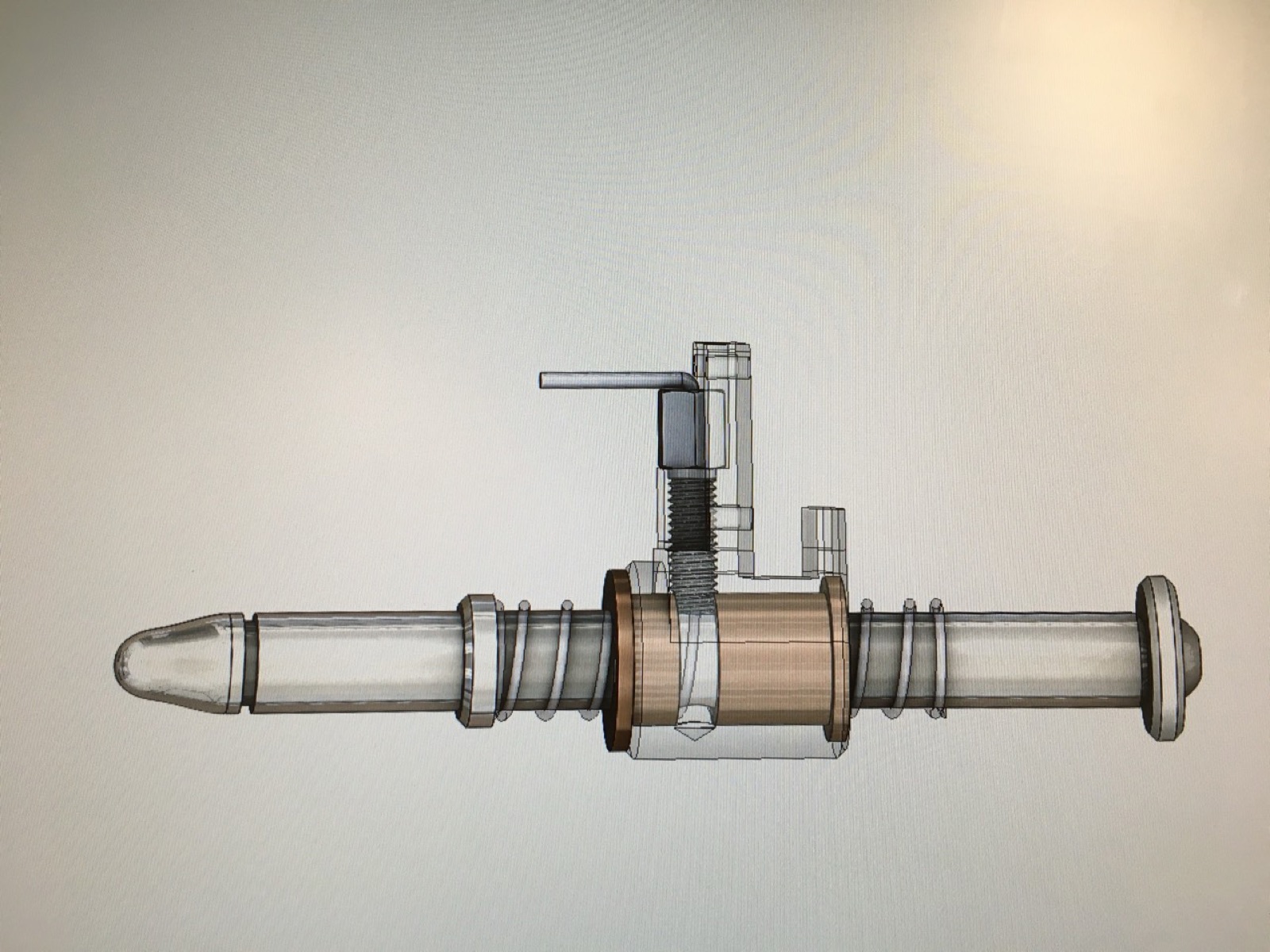 CAD view of a transparent suction pen assembly with tube, springs, and clamp hardware.